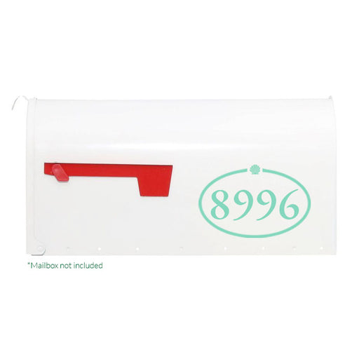 Custom mailbox number with a seashell coastal design.